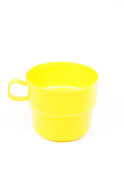 Yellow plastic glass — Stock Photo, Image