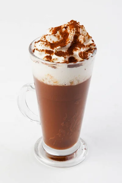 hot chocolate with cream in a transparent glass