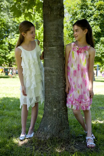 Two little girls in the park — Stock Photo, Image