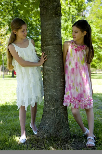 Two little girls in the park — Stock Photo, Image