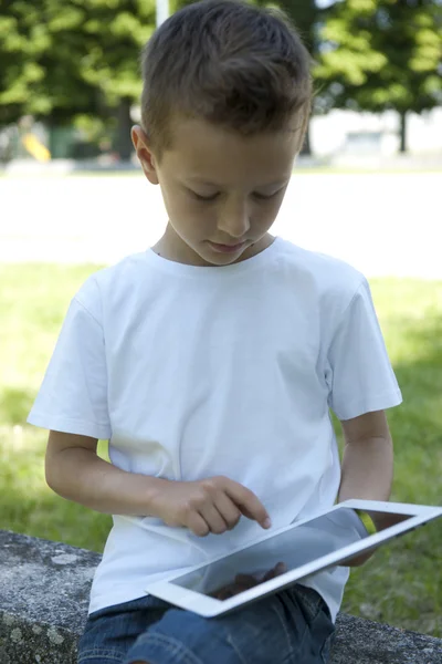 Little boy with PC tablet — Stock Photo, Image