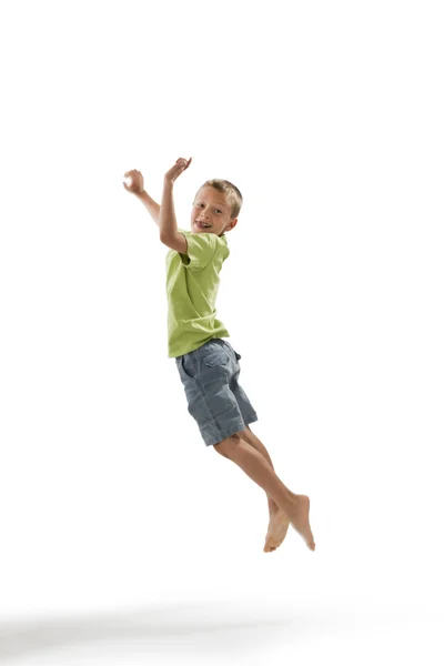Rapazinho saltando — Fotografia de Stock