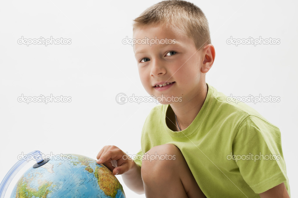 Little boy with globe