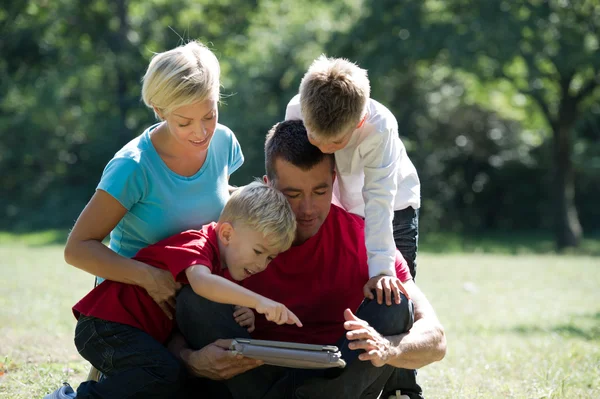Family using PC tablet — Stock Photo, Image