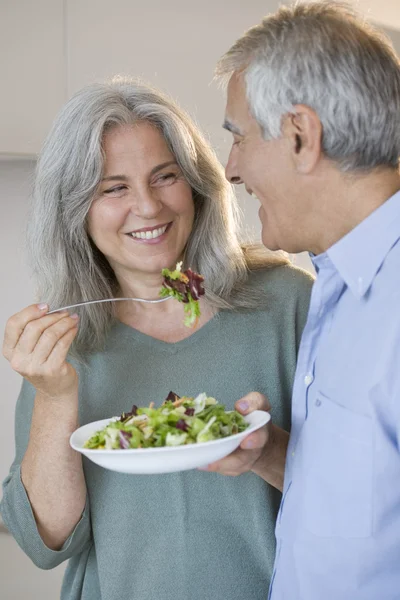 Senior couple eating Stock Picture