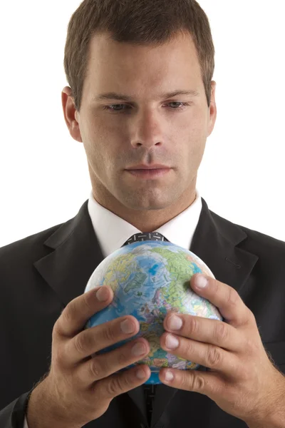 Empresário segurando globo — Fotografia de Stock