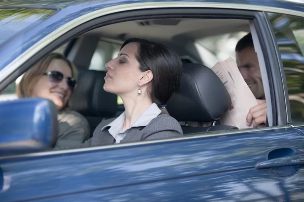 Business people sharing car — Stock Photo, Image