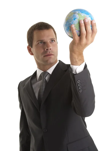 Businessman holding globe — Stock Photo, Image