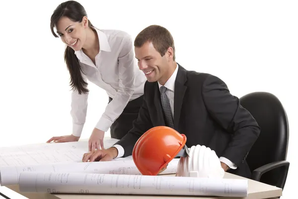 Business people working on blue prints — Stock Photo, Image