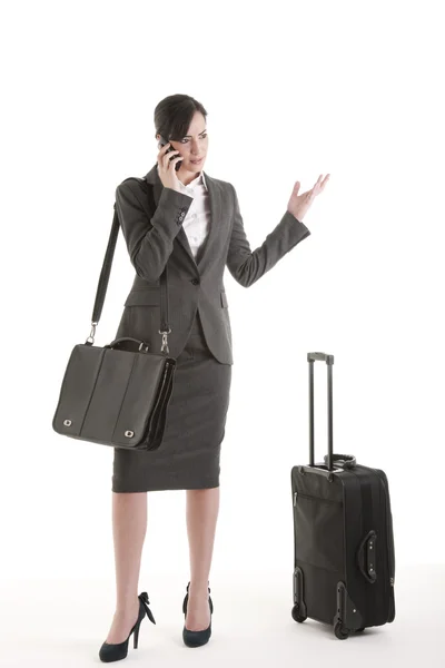 Business traveller on the phone — Stock Photo, Image