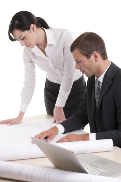 Business people working on blue prints — Stock Photo, Image
