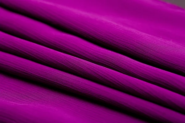 Purple, violet tender colored textile, elegance rippled material — Stock Photo, Image