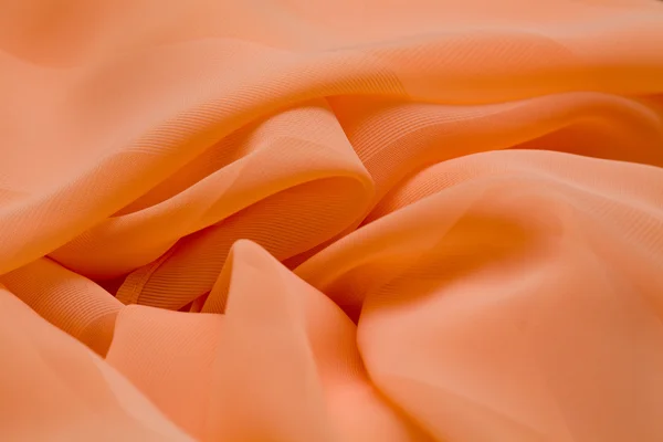 Pink, salmon silk tender colored textile, elegance rippled material — Stock Photo, Image