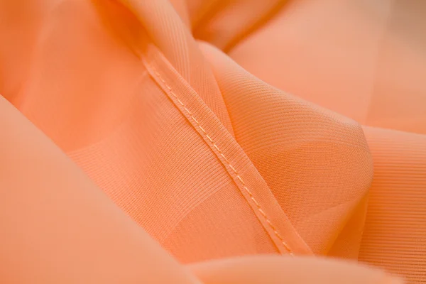 Pink, salmon silk tender colored textile, elegance rippled material — Stock Photo, Image