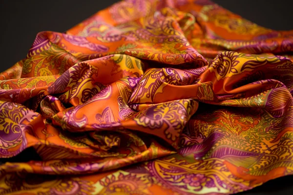 Red, yellow, orange tender colored textile, elegance rippled material — Stock Photo, Image