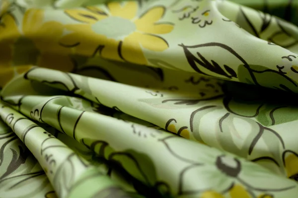 Green, yellow tender colored textile, elegance rippled material — Stock Photo, Image