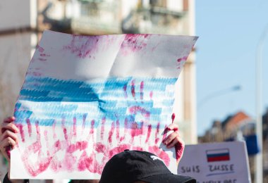 War in Ukraine, support with poster, Strasbourg, France, Russian consulate, February 2022