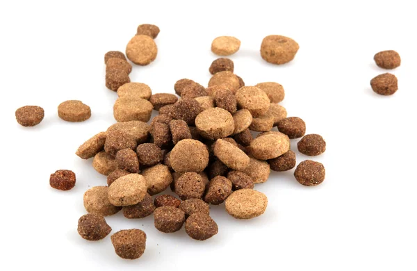 Dry dog food isolated on white — Stock Photo, Image