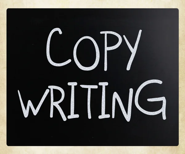 "Copywriting ”handskrivna med vit krita på en svart tavla — Stockfoto