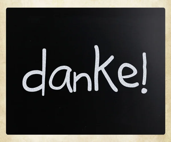 "Danke!" handwritten with white chalk on a blackboard — Stock Photo, Image