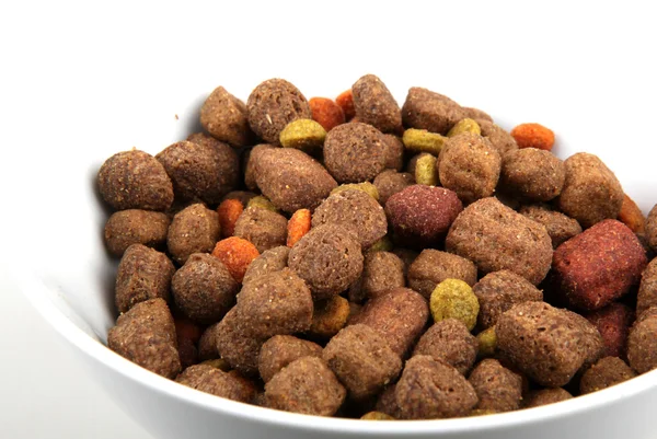 Dry dog food isolated on white — Stock Photo, Image