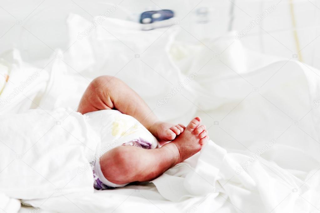 newborn baby in incubator