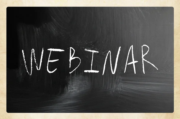 The word "Webinar" handwritten with white chalk on a blackboard — Stock Photo, Image