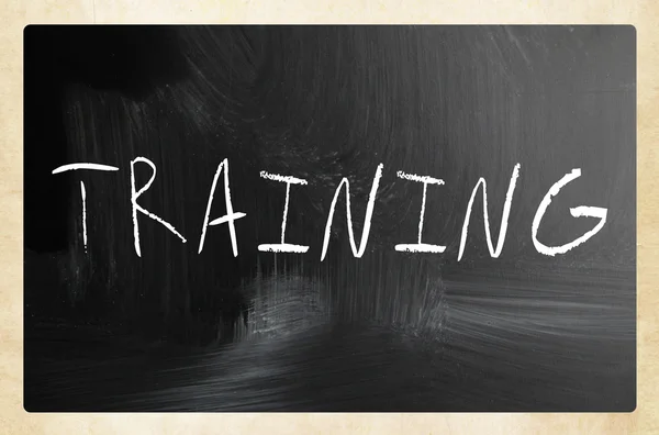 "Training" handwritten with white chalk on a blackboard — Stock Photo, Image