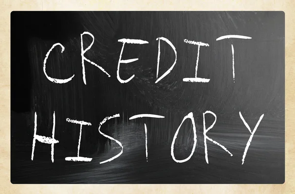 "Credit Historiek "handgeschreven met wit krijt op een Blackboard — Stockfoto