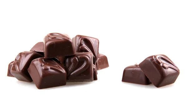 Halmozott csokoládé, a fehér háttér — Stock Fotó