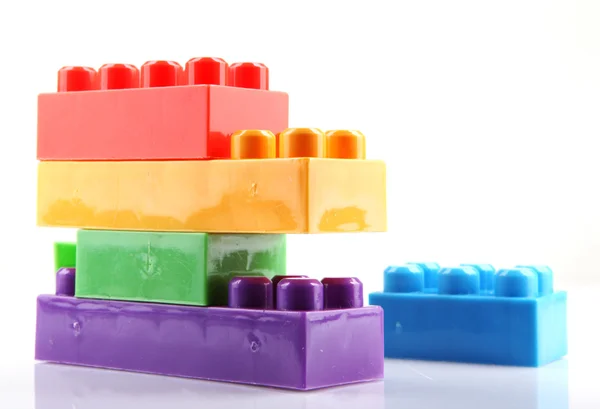 Plastic building blocks on a white background — Stock Photo, Image