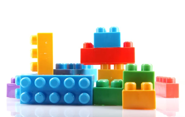 Plastic building blocks on a white background — Stock Photo, Image