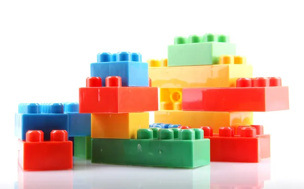 Plastic building blocks on a white background — Stock Photo, Image