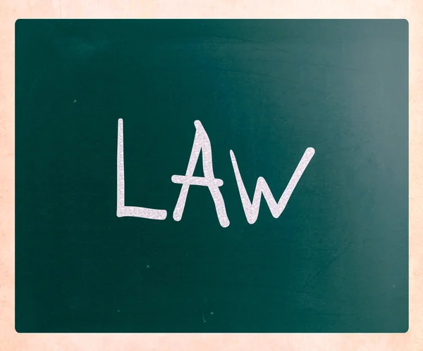 The word "Law" handwritten with white chalk on a blackboard — Stock Photo, Image