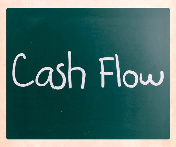 "Cash flow" handwritten with white chalk on a blackboard — Stock Photo, Image