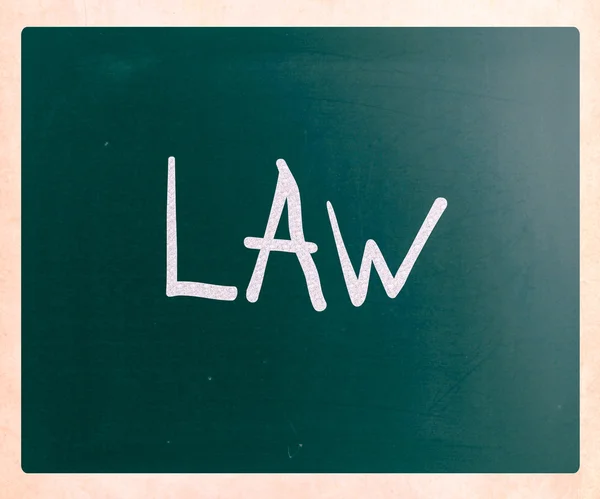 "Law" handwritten with white chalk on a blackboard — Stock Photo, Image