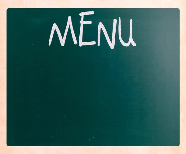 Het woord "menu" met de hand geschreven met wit krijt op een schoolbord — Stockfoto