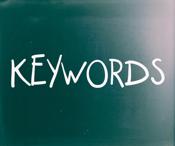 The word "Keywords" handwritten with white chalk on a blackboard — Stock Photo, Image