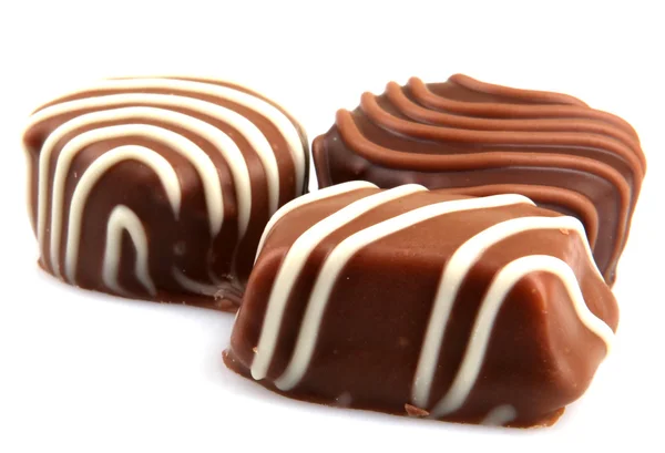 Chocolate isolado sobre um fundo branco — Fotografia de Stock