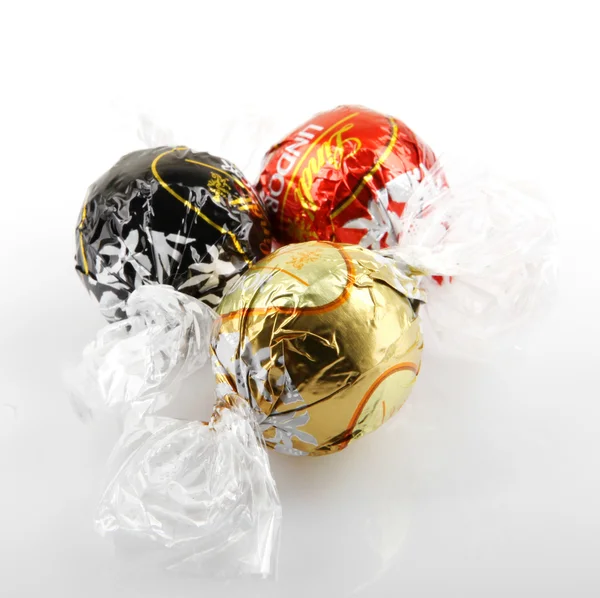 AYTOS, BULGARIA - APRIL 02, 2014: Milk Chocolate LINDOR truffle. Lindt is recognized as a leader in the market for premium quality chocolate. — Stock Photo, Image