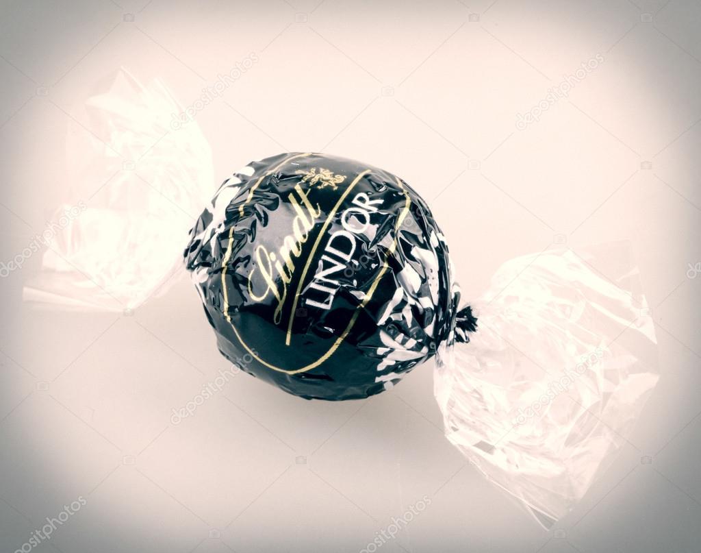 AYTOS, BULGARIA - APRIL 02, 2014: Milk Chocolate LINDOR truffle. Lindt is recognized as a leader in the market for premium quality chocolate.
