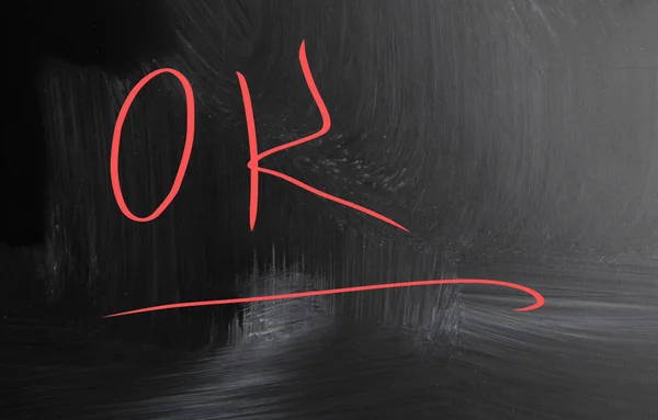 OK handwritten with chalk on a blackboard — Stock Photo, Image