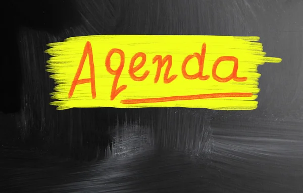 Agenda handwritten with chalk on a blackboard — Stock Photo, Image