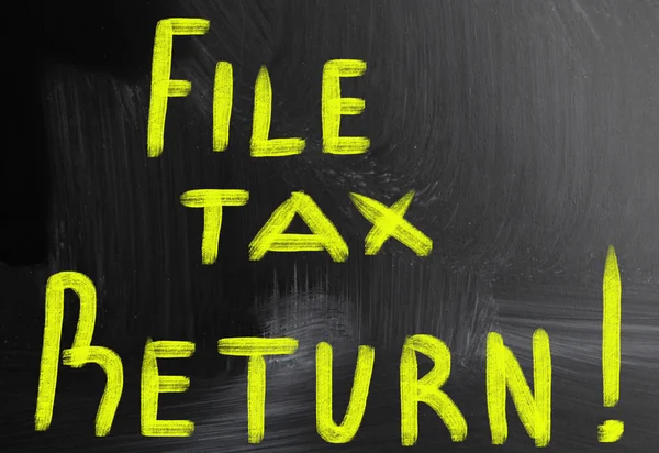 File tax return handwritten with chalk on a blackboard — Stock Photo, Image