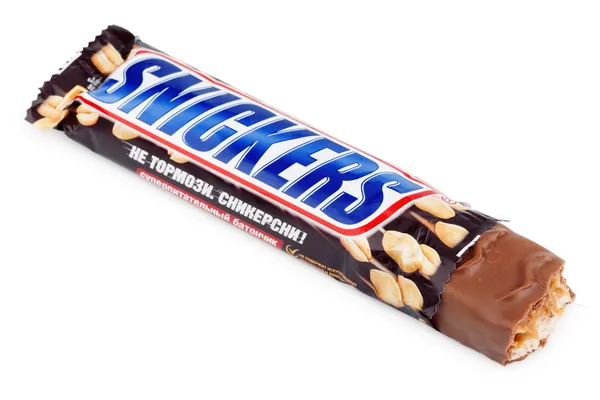 Unwrapped Snickers candy chocolate bar — Stock Photo, Image