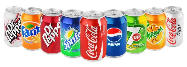 Group of various soda drinks in aluminum cans isolated on white — Stock Photo, Image