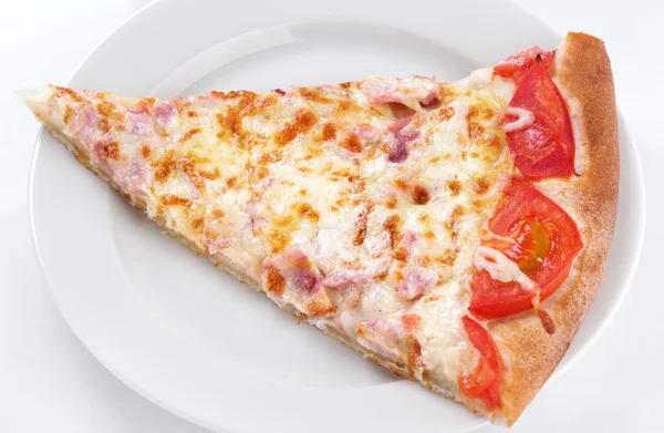 Slice of pizza on plate — Stock Photo, Image