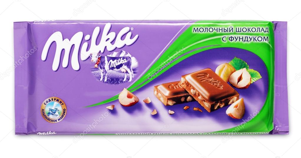 Bar of milk chocolate Milka with hazelnut made by Mondelez International isolated on white with clipping path