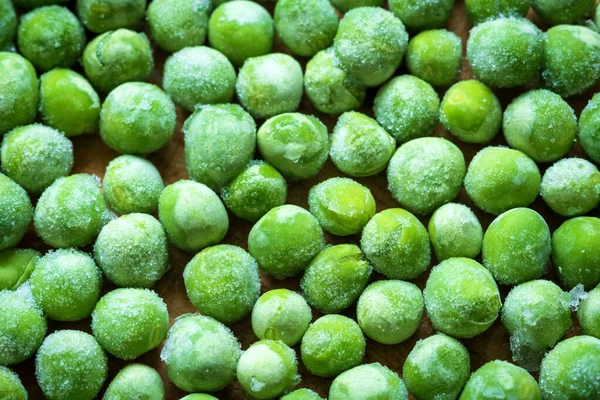 凍てつく緑のエンドウ豆の背景の密接な — ストック写真