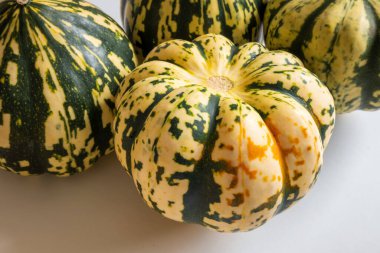 Ripe squash pumpkins background closeup.